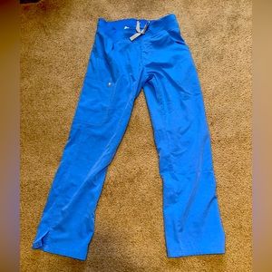 Women Figs size small petite ceil blue scrub pants. Used but great condition.